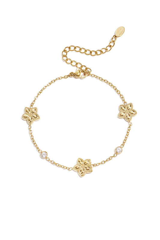Armband met een afwisselend patroon van bloemen en stenen